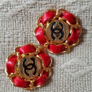 Chanel clip on costume earrings, gold plated with leather woven through chain.